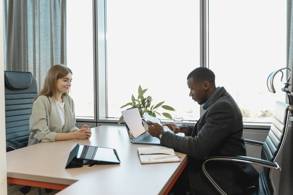 Free Man Interviewing the Woman Stock Photo