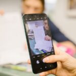No scanner needed: your phone's camera turns any paper into a clean, multi-page PDF for free — using the apps already on your iPhone or Android phone. Here's how.