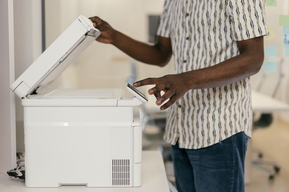 Flatbed scanner with its lid open waiting for a document