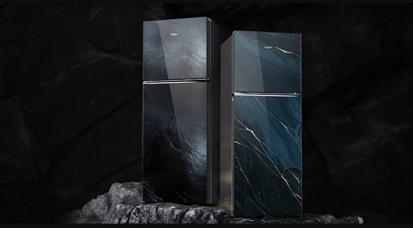 Two Whirlpool double door refrigerators with dark glass finishes